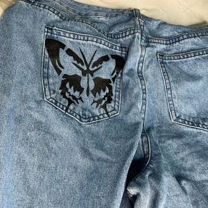 Blue butterfly jeans